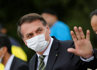 O presidente do STJ, João Otávio Noronha, suspendeu a decisão que obrigava o presidente Jair Bolsonaro a apresentar laudos de covid-19. (Foto: Adriano Machado/Reuters)