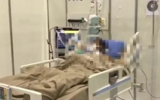 Paciente em tratamento contra a Covid-19 em leito de hospital em Goiás — Foto: Reprodução/TV Anhanguera